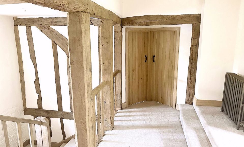 Oak staircase and beams after restoration