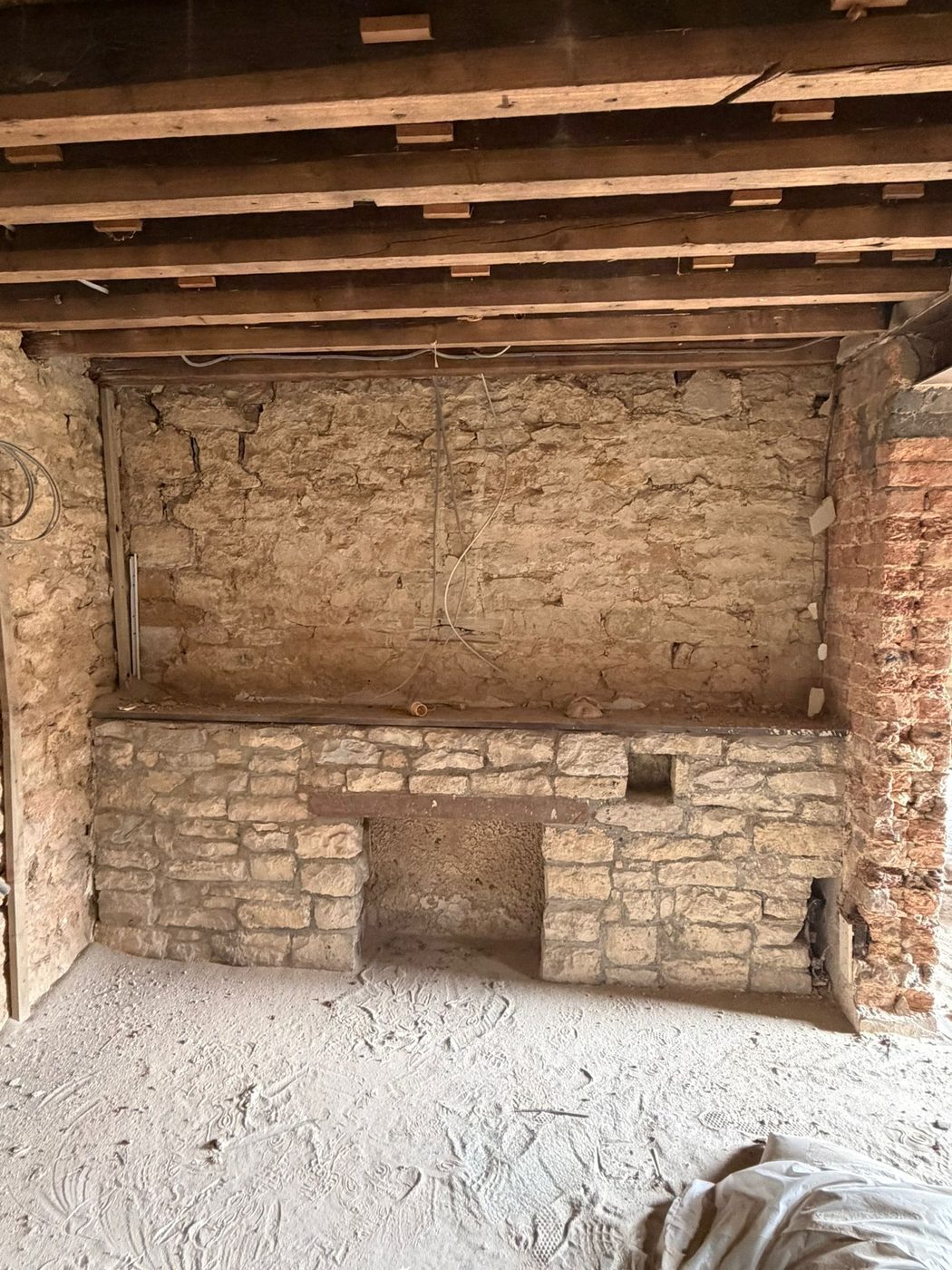 Inglenook stone fireplace after cleaning